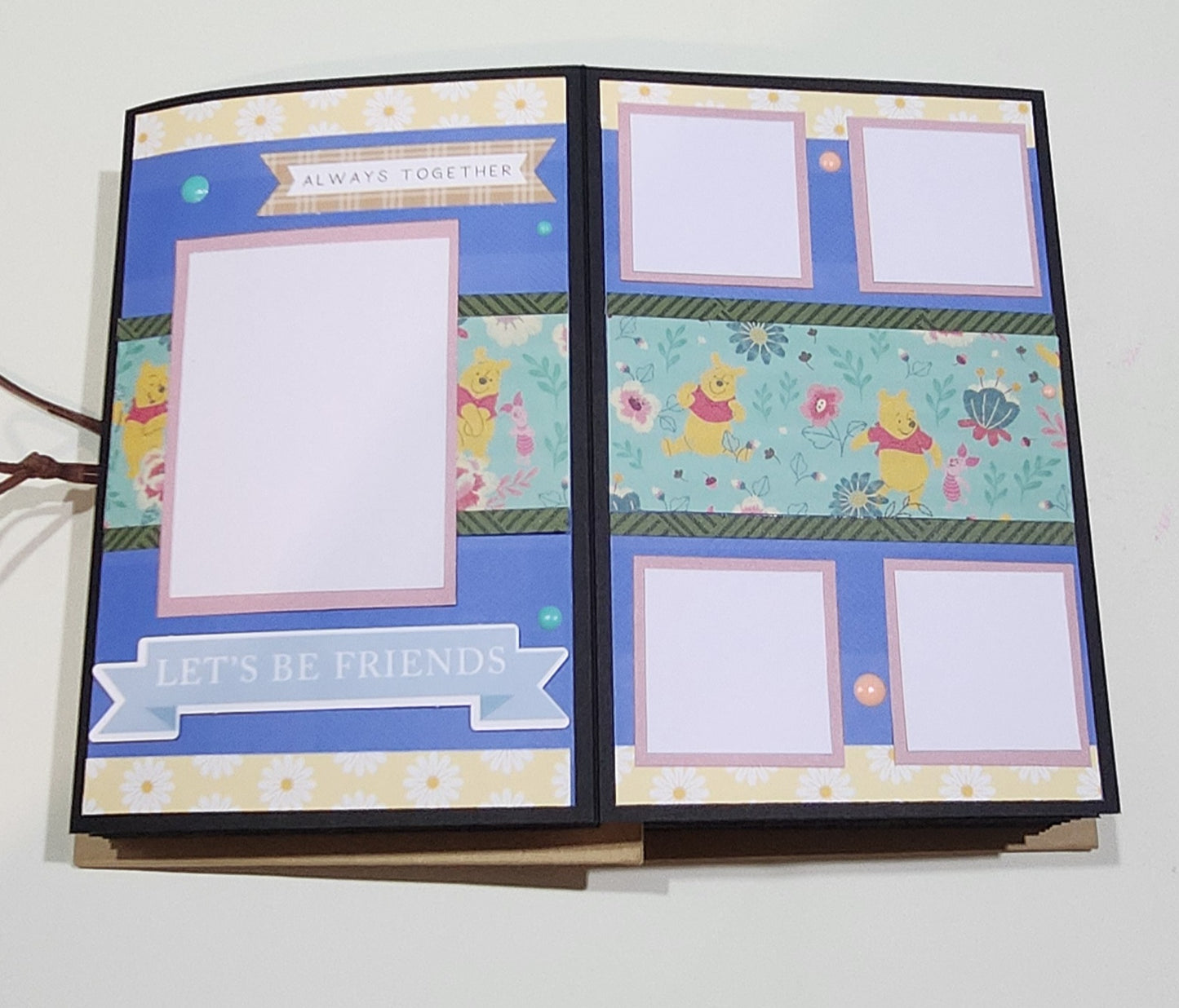 Two decorative pages with Winnie the Pooh illustrations and text on a white background
